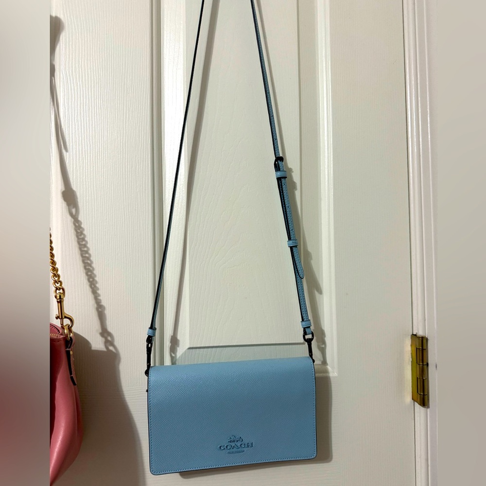 Blue crossbody Coach purse